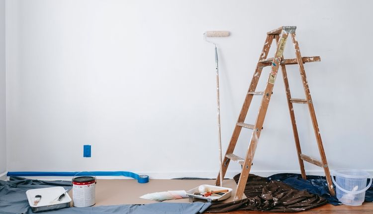 Painting Materials Beside a Ladder